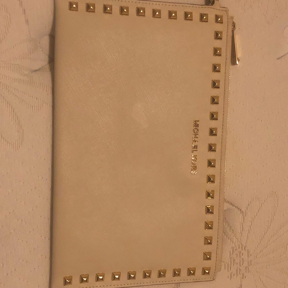 Michael Kors cream wristlet bag